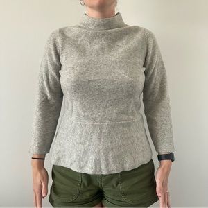 Ann Taylor mock neck sweater with slight flare at natural waist
